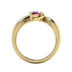 Enchanted pear ruby ring in yellow gold, straight-on view showing clean band interior and low-set asymmetric profile