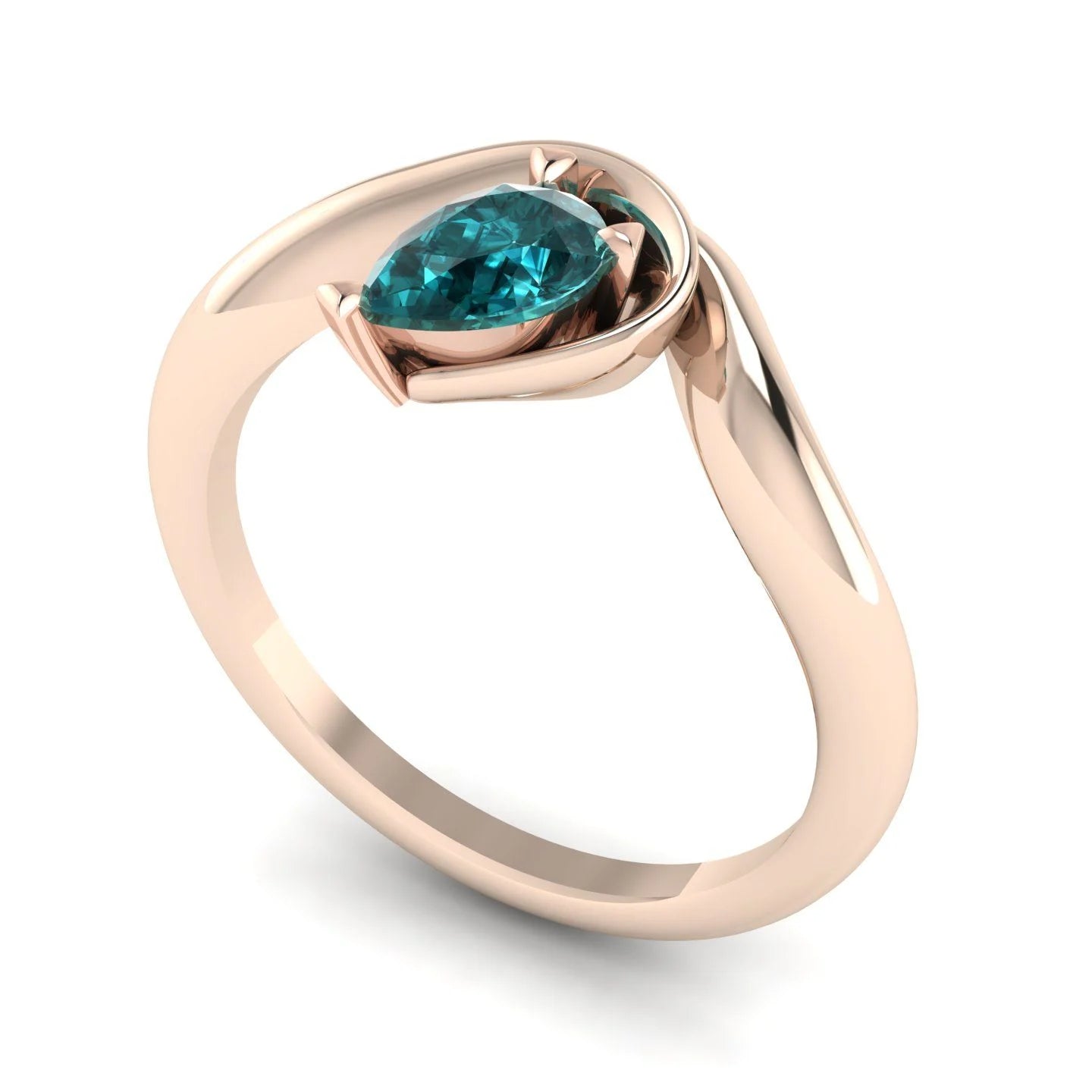 Enchanted teal sapphire pear engagement ring in rose gold, three-quarter angle view showing ocean-hued stone nestled in asymmetric organic setting