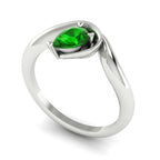 Enchanted pear tsavorite ring in white gold, straight-on front view showing asymmetric setting