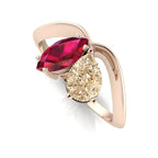 Close up of Entwined Toi et Moi ring showing champagne diamond and marquise ruby in rose gold setting