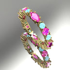 Fire & Ice eternity ring with aquamarine and pink sapphire in 18ct yellow gold.