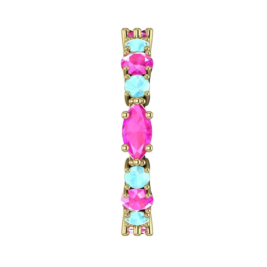 Macro shot showing the contrast between yellow gold, pink sapphire, and blue aquamarine.