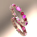 Fire eternity ring with rubies and pink sapphires in 18ct rose gold.