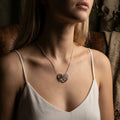 Scale view of the 5-link sterling silver Model image Vanilla pendant demonstrating the length and statement scale of the design.