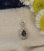 Fleur London Blue Topaz flower pendant in recycled sterling silver with adjustable chain
