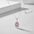 Fleur pink tourmaline geometric flower pendant in recycled sterling silver, handmade by Nude Jewellery London
