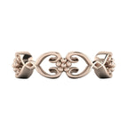 Flowers On The Vine floral wedding ring in 18ct rose gold, top-down view showing full circular band pattern