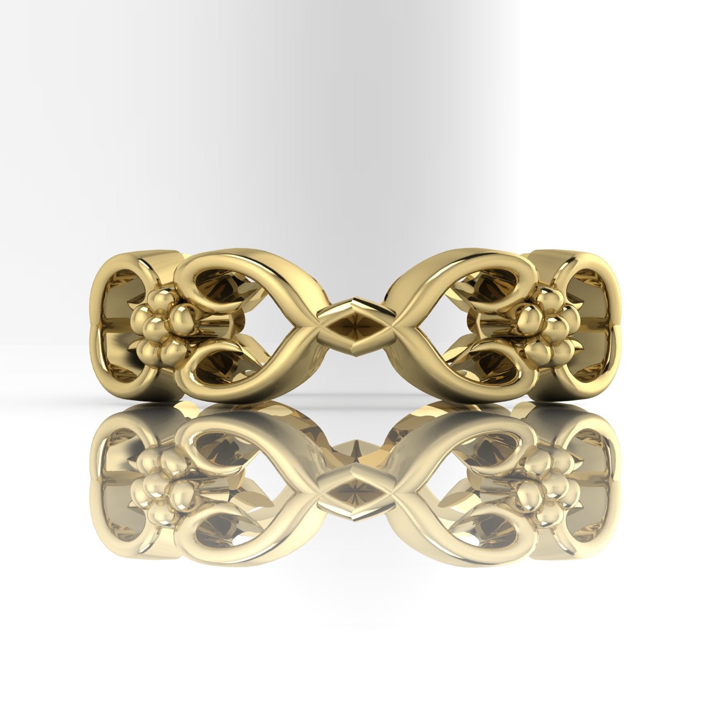 Flowers On The Vine floral wedding ring in 18ct yellow gold, side view showing delicate open side vine and blossom detail