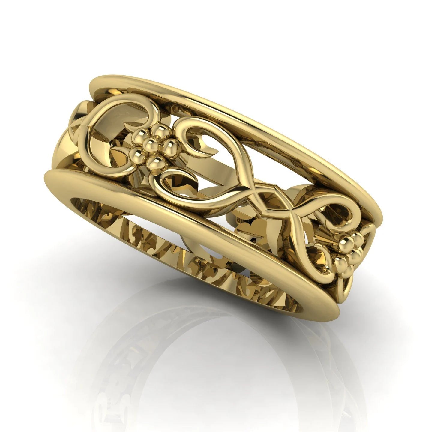 Flowers On The Vine floral wedding ring in 18ct yellow gold, angled view showing open vine and blossom detail