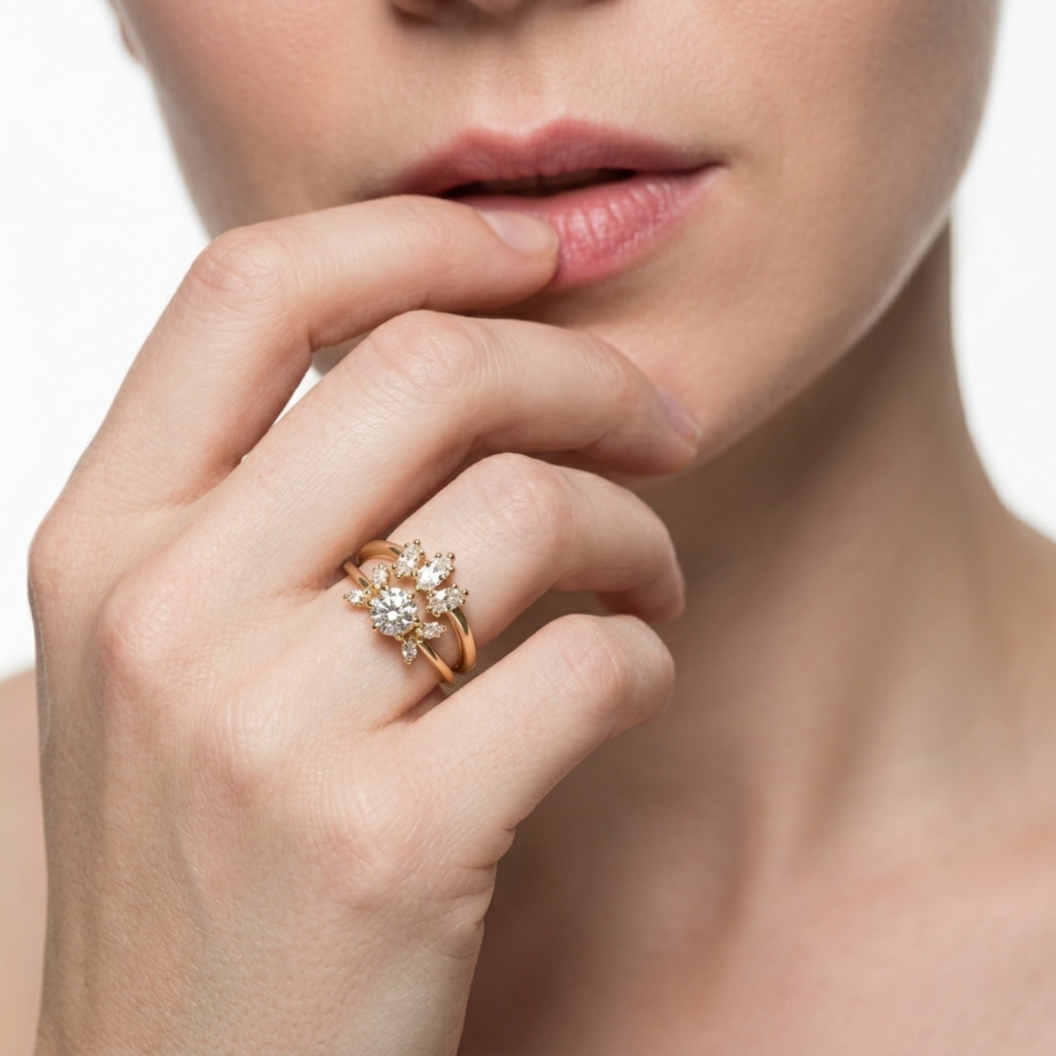 The Flutterby engagement and wedding ring set on model. rose gold