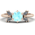 Flutterby aquamarine butterfly cluster ring three-quarter view — round aquamarine centre with four marquise diamond wings in recycled 18ct rose gold by Nude Jewellery