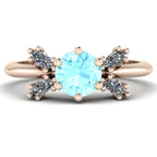 Flutterby aquamarine butterfly cluster ring three-quarter view — round aquamarine centre with four marquise diamond wings in recycled 18ct rose gold by Nude Jewellery