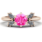 Flutterby pink sapphire butterfly engagement ring front view — round pink sapphire centre with four white marquise diamond wings in recycled 18ct rose gold by Nude Jewellery