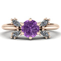 Flutterby lavender sapphire butterfly engagement ring front view — round lavender sapphire centre with four marquise diamond wings in 18ct rose gold by Nude Jewellery