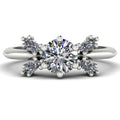 Flutterby diamond butterfly engagement ring front view — brilliant-cut centre diamond with four marquise-cut wings in platinum by Nude Jewellery