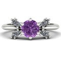 Flutterby lavender sapphire butterfly engagement ring front view — lavender sapphire centre with four white marquise diamond wings in recycled 18ct white gold by Nude Jewellery