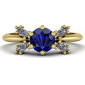 Flutterby blue sapphire butterfly engagement ring front view — deep blue sapphire centre with four marquise diamond wings in recycled 18ct yellow gold by Nude Jewellery