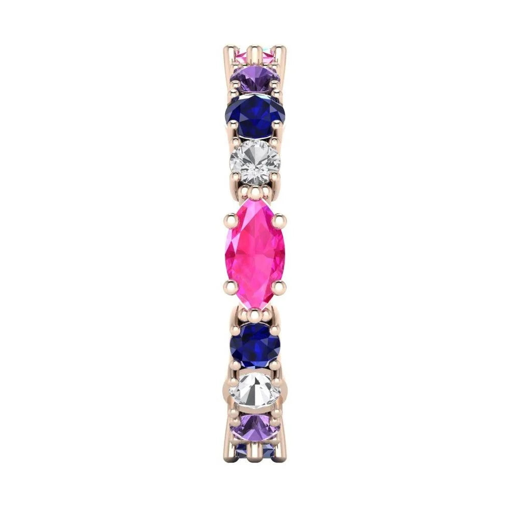 Profile view of the multi-coloured Allsorts eternity ring in 18ct rose gold showing the alternating gemstone heights and architectural silhouette.