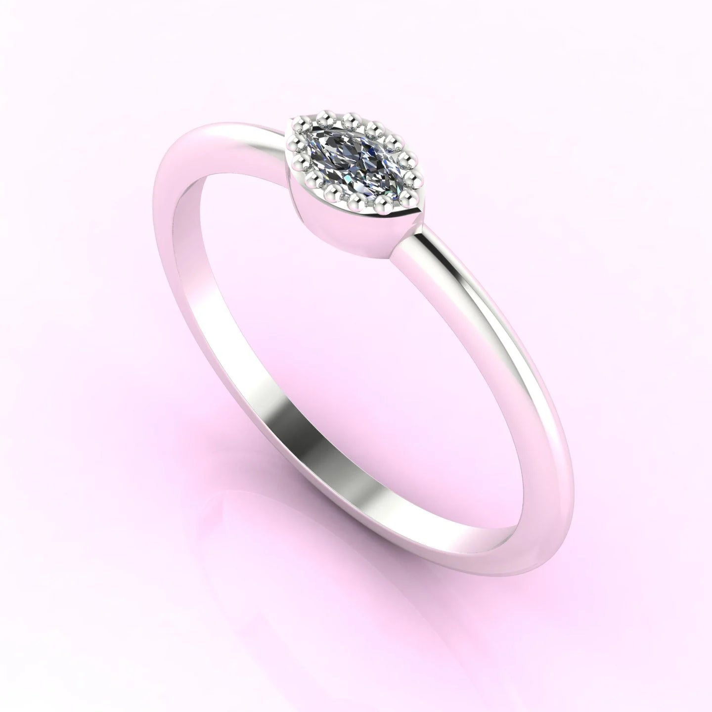 Three-quarter view of a horizontal marquise diamond ring showing the handmade platinum setting.