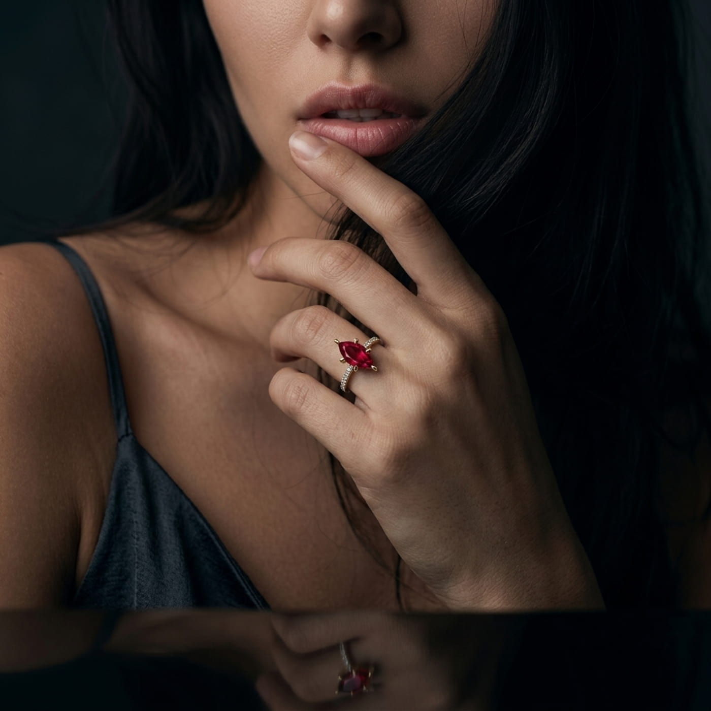 Handmade ruby and diamond engagement ring, worn on model — unique design by Nude Jewellery, London.