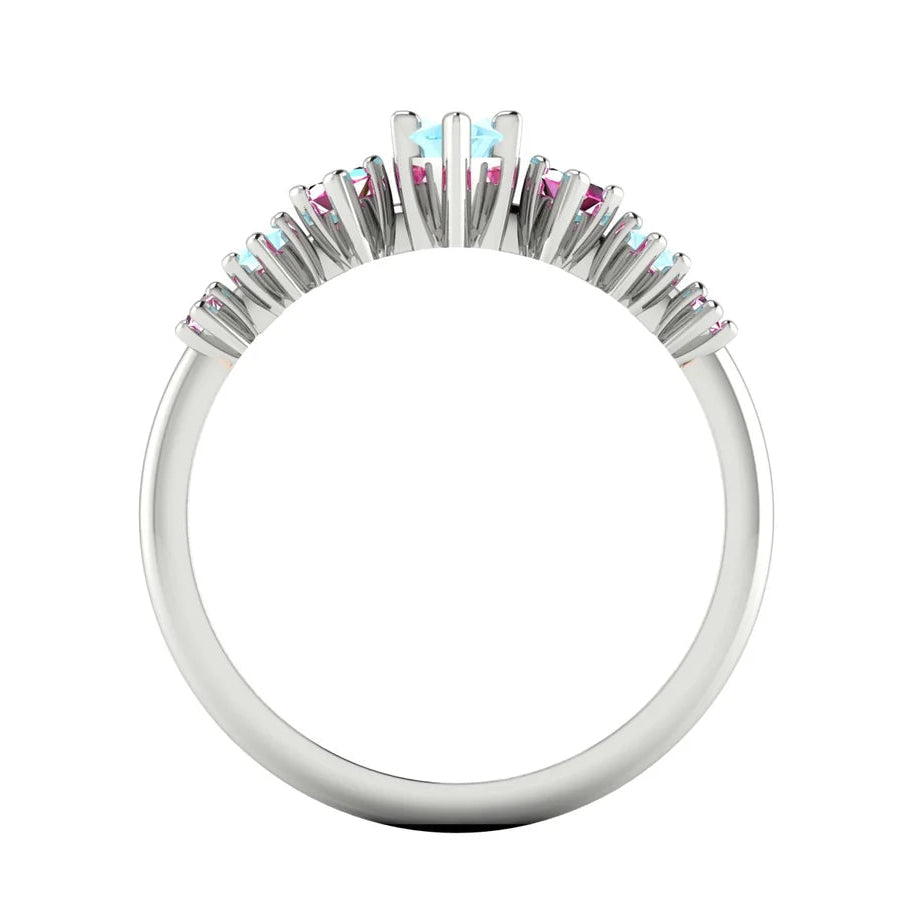 Seven marquise aquamarines and pink sapphires arranged across the Harlequin ring - through view