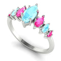 Harlequin seven-stone ring with marquise aquamarines and pink sapphires in a white metal setting