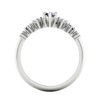 Harlequin seven-stone ring with blue sapphires and marquise diamonds in a white metal setting - through