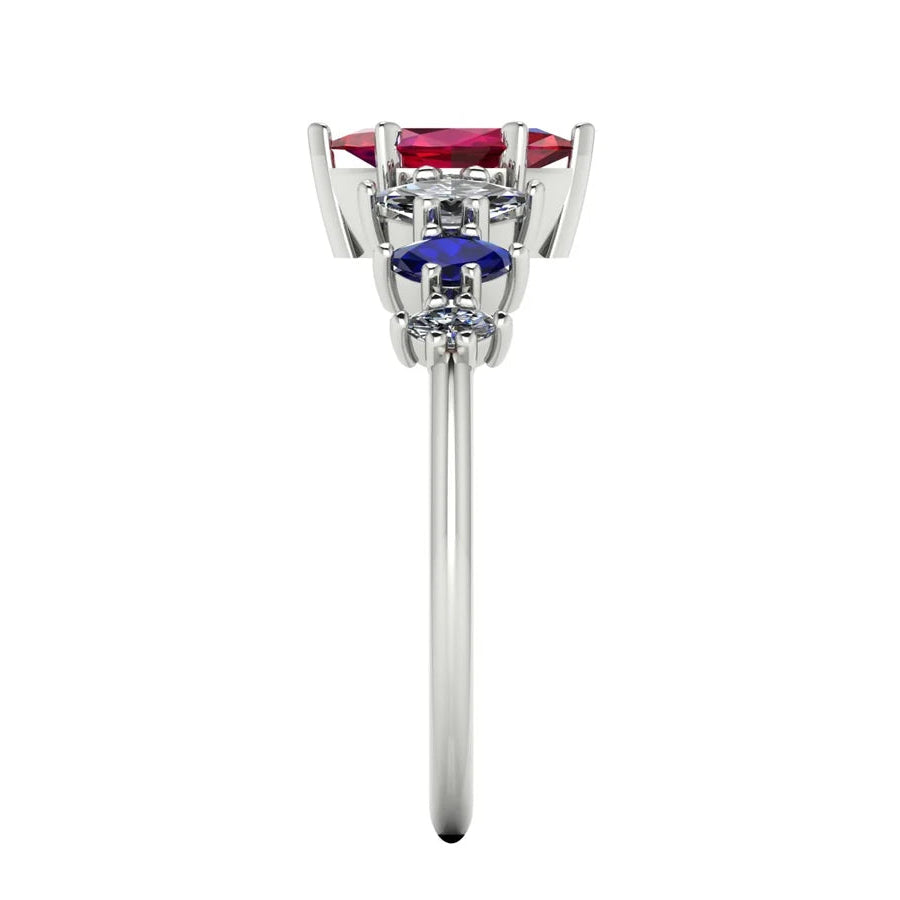 Harlequin gemstone ring featuring a ruby centre and blue sapphire and diamond accents - side