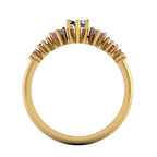Harlequin ring featuring a blue sapphire, violet and pink sapphires, and rubies