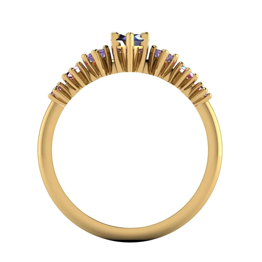 Harlequin ring featuring a blue sapphire, violet and pink sapphires, and rubies