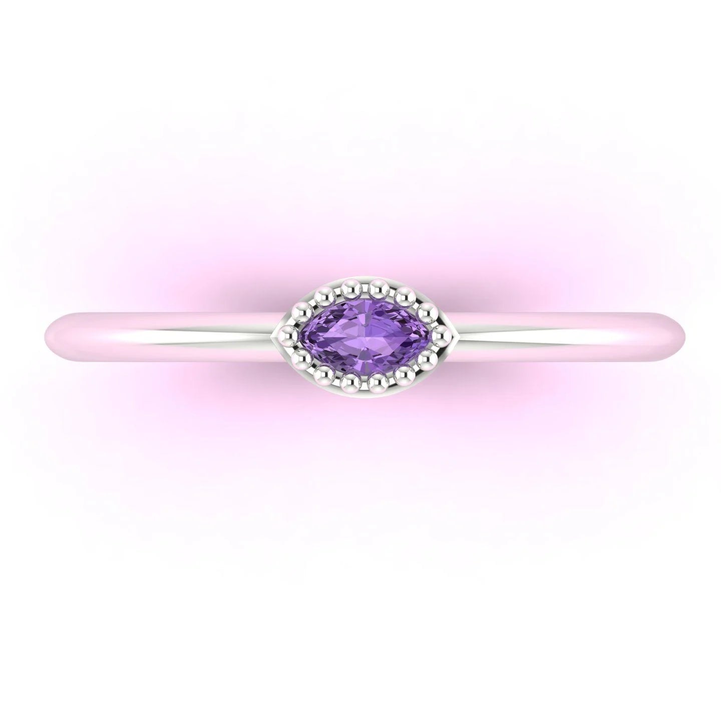 Top view of the violet sapphire Mini Astraea ring showing the horizontal stone placement across the finger.