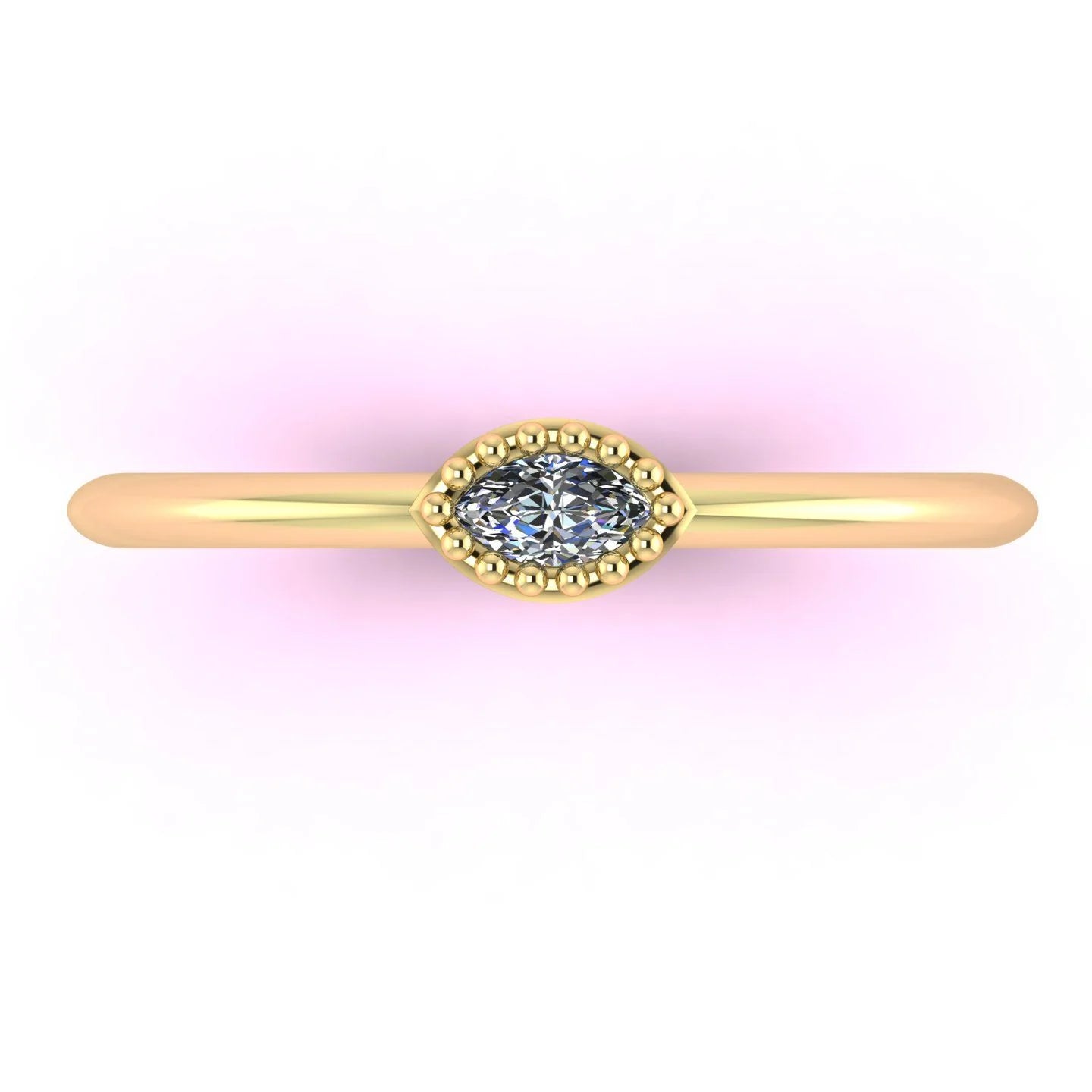 Top view of the yellow gold Mini Astraea ring showing the elongated marquise diamond set horizontally across the finger.