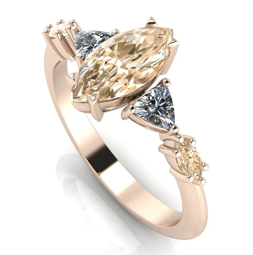 Maisie marquise champagne diamond engagement ring in 18ct rose gold, angled view showing the marquise diamond and rose gold band, handmade in our London studio