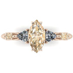 Maisie marquise champagne diamond engagement ring in 18ct rose gold, close-up detail showing the champagne marquise diamond and fine rose gold prongs, handmade in our London studio