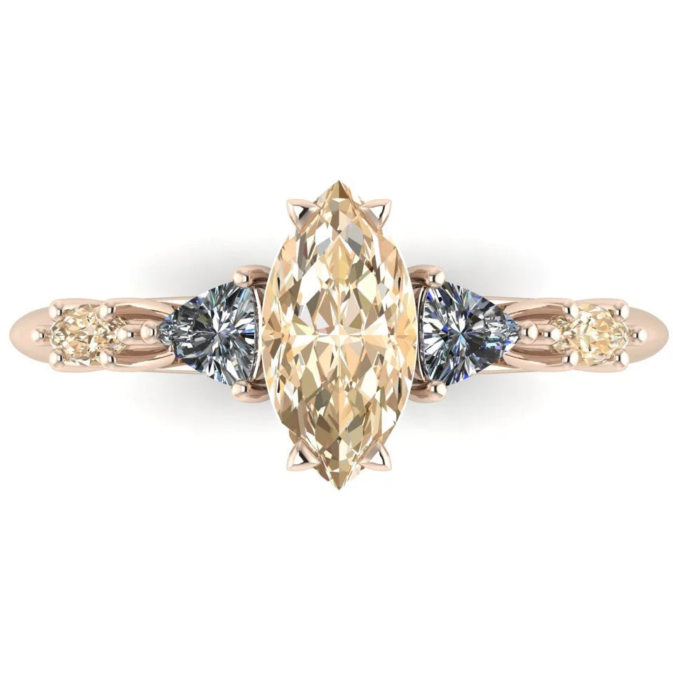 Maisie marquise champagne diamond engagement ring in 18ct rose gold, close-up detail showing the champagne marquise diamond and fine rose gold prongs, handmade in our London studio