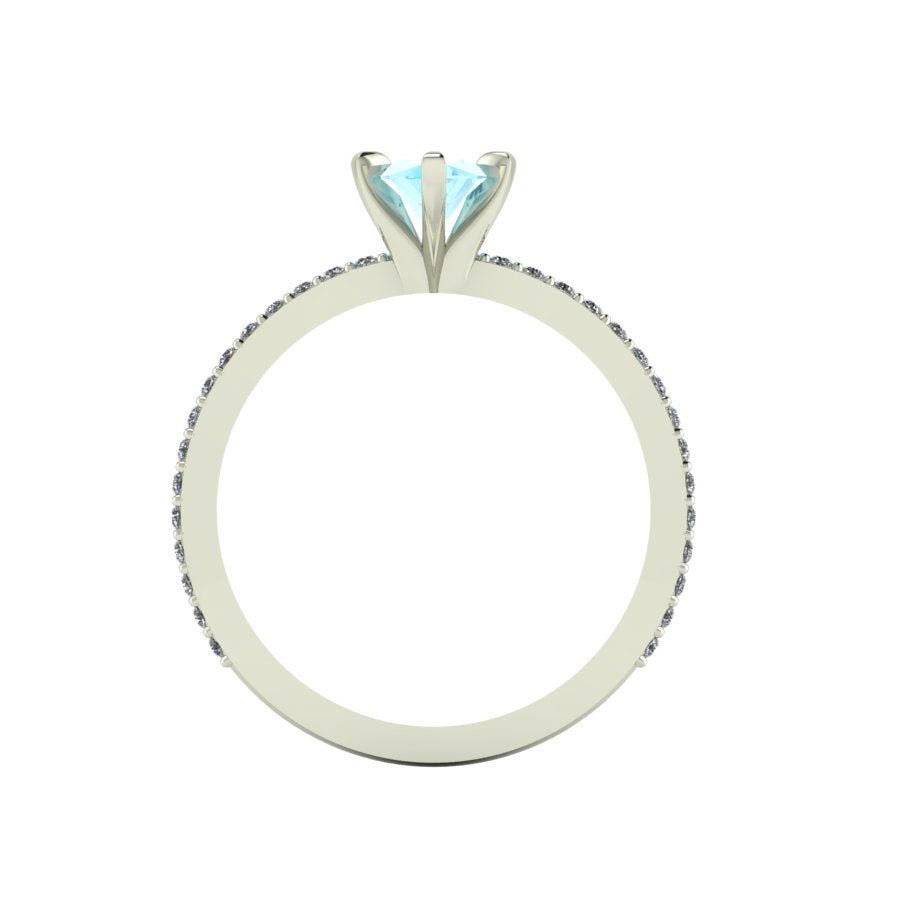 A through-finger view of the Amoret aquamarine ring showing the internal band and the clean, architectural setting symmetry.
