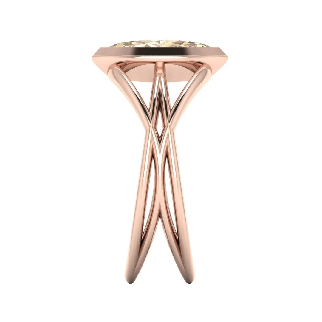 Infinity marquise champagne diamond ring in 18ct rose gold, side profile showing the elegant marquise diamond set in the sculptural wrap-around band, alternative engagement ring handmade in London