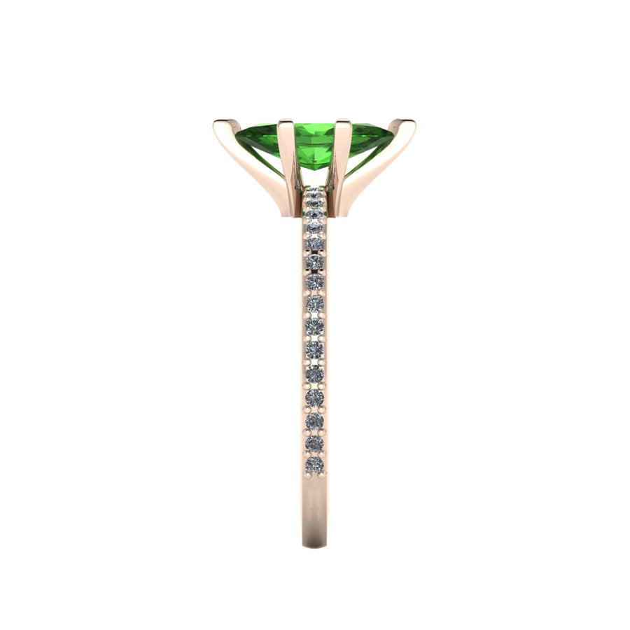 Close-up side view of the 18ct rose gold Amoret ring highlighting the secure claw setting for the green tourmaline and white diamond shoulders.