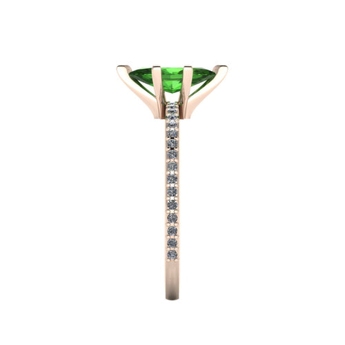 Close-up side view of the 18ct rose gold Amoret ring highlighting the secure claw setting for the green tourmaline and white diamond shoulders.