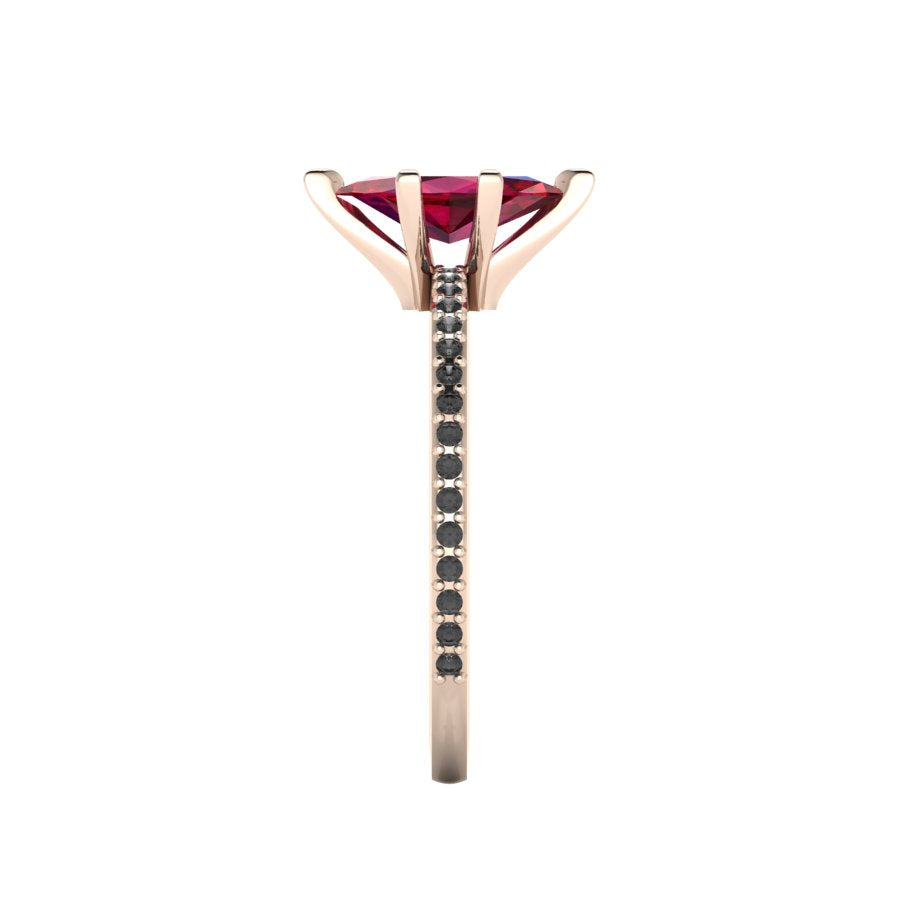 Close-up side view of the 18ct rose gold Amoret ring highlighting the secure claw setting and the black diamond-set shoulders.
