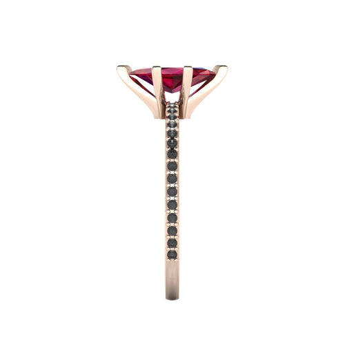 Close-up side view of the 18ct rose gold Amoret ring highlighting the secure claw setting and the black diamond-set shoulders.