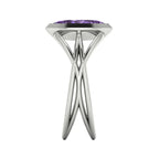 Infinity marquise violet sapphire ring in 18ct white gold, side profile showing the elegant low-set marquise violet sapphire and sculptural band, handmade in London