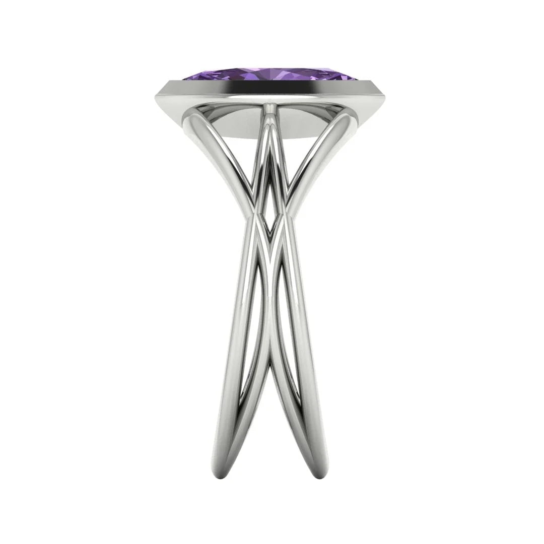 Infinity marquise violet sapphire ring in 18ct white gold, side profile showing the elegant low-set marquise violet sapphire and sculptural band, handmade in London