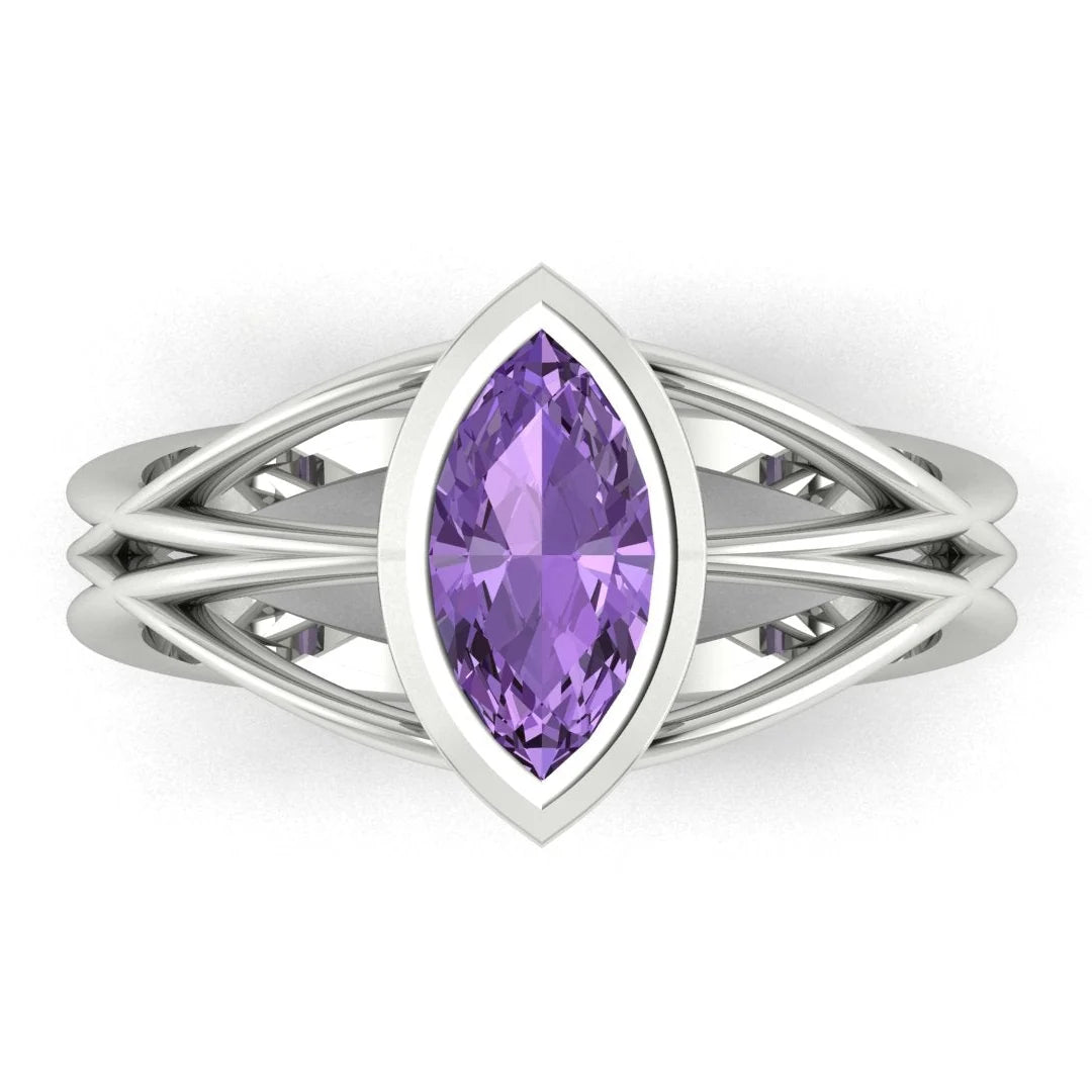 Infinity marquise violet sapphire ring in 18ct white gold, overhead view showing the vivid violet marquise sapphire in the continuous wrap band, alternative engagement ring handmade in London