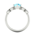 milena aquamarine and diamond white gold or platinum engagement ring through finger view
