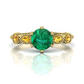 Milena five-stone engagement ring in 18ct recycled yellow gold with vivid emerald centre and yellow sapphire shoulders, by Nude Jewellery