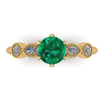 round emerald and diamond 5 gemstone enggaement ring