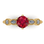 Top-down view of the Milena engagement ring showing the vivid ruby centre stone and four diamond side stones in 18ct yellow gold