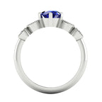 milena sapphire and diamonds through finger view