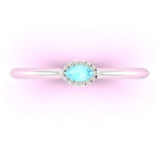 Top view of Mini Astraea horizontal marquise aquamarine ring in 18ct white gold or platinum.
